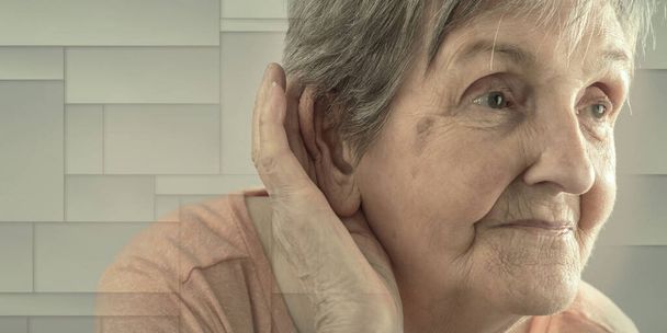 Elderly woman having earing problem, geometric pattern - Foto, Imagen