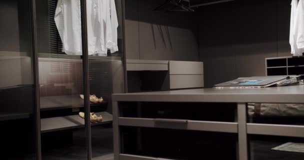 Black wardrobe with Sliding Black Doors. , Luxury Bedroom With Walk In Closet. - Záběry, video
