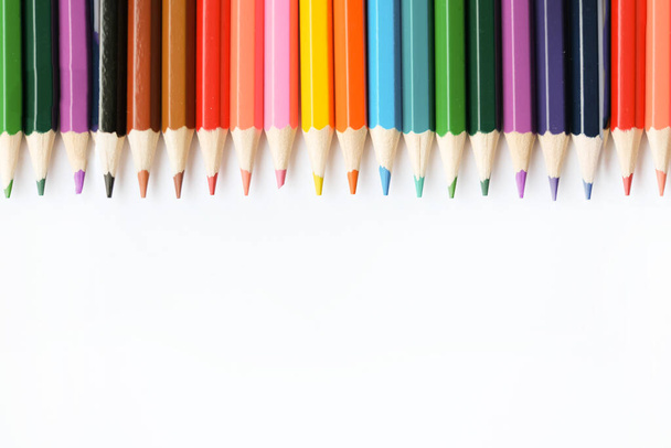 A set of colored pencils isolated on a white background in banner format. Place for text - 写真・画像