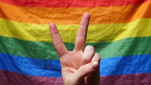Symbol of peace on a rainbow background - Foto, Imagem