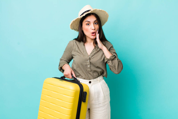 young pretty woman feeling shocked and scared. travel concept - Foto, Imagen