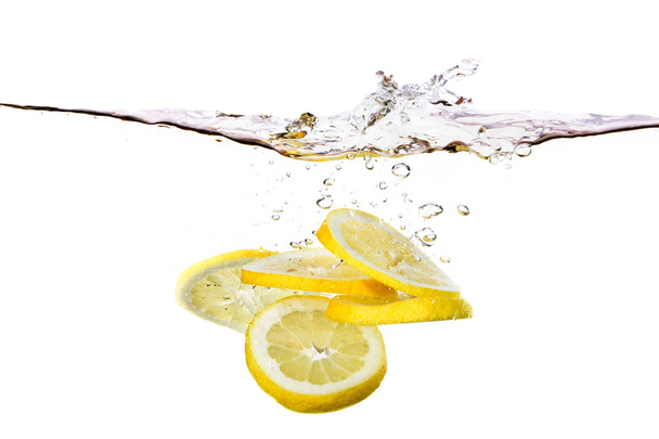 Lemon Slices in Water - Фото, зображення