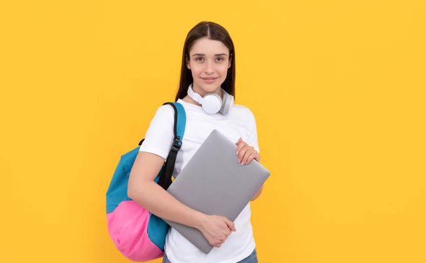 cheerful lady in headphones hold pc carry backpack, school - Foto, imagen