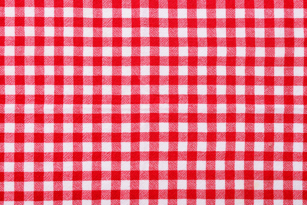 Red checkered tablecloth for picnic as background - Foto, immagini