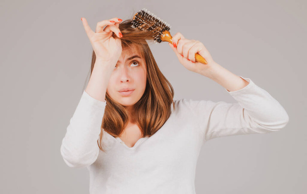 Hair for hair loss problem, woman show her hair tangled damaged hair. - Photo, Image