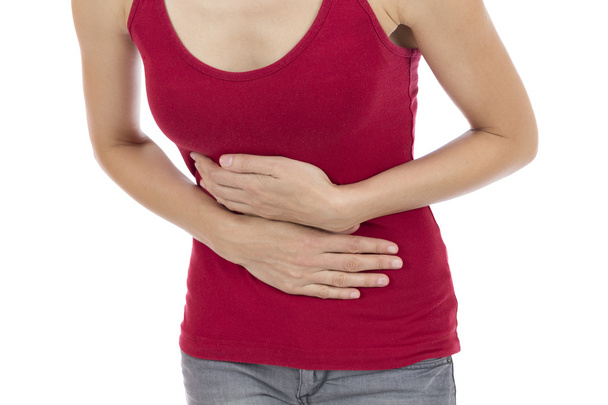 Γυναίκα με ένα πόνο στο στομάχι - Φωτογραφία, εικόνα