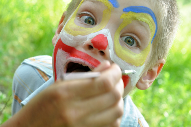 Child face mask party painting - 写真・画像