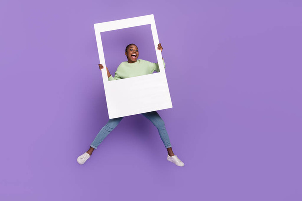 Full length photo of overjoyed good mood female take polaroid photo of herself isolated on violet color background - Foto, Imagem