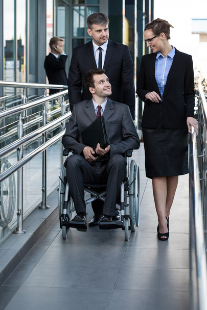 Businessman on a wheelchair - Foto, Bild