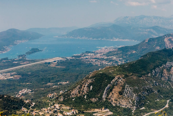 Beautiful nature mountains landscape. Kotor bay, Montenegro. Views of the Boka Bay, with the cities of Kotor and Tivat with the top of the mountain, Montenegro - 写真・画像