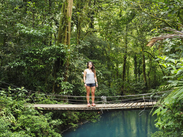 young woman hiking in rio celeste - Photo, Image
