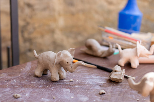  toy elephant made of ceramic clay  - Valokuva, kuva