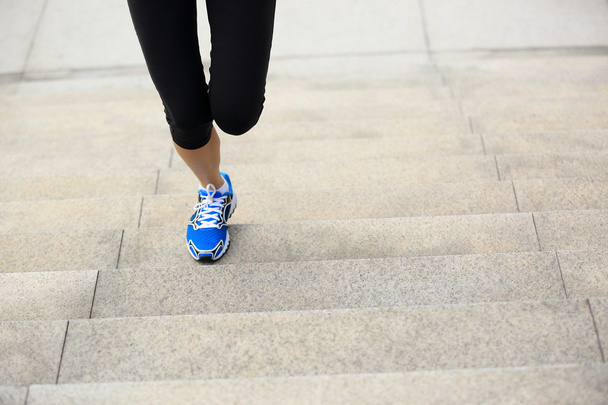 Legs running up on stone stairs - Fotografie, Obrázek