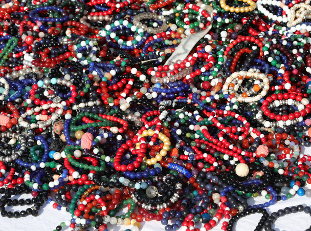 many beaded bracelets for sale in the stall at the market of fashion accessories - Foto, immagini