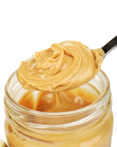 Creamy peanut butter in jar - Фото, изображение