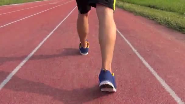 Runner running on the track in stadium - Footage, Video
