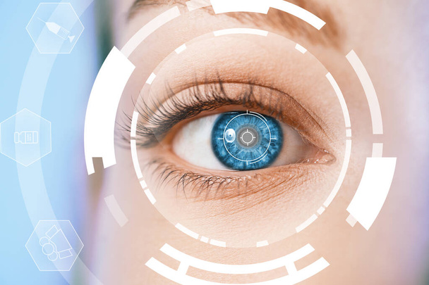 Young woman with iris scanning, closeup view - Foto, afbeelding