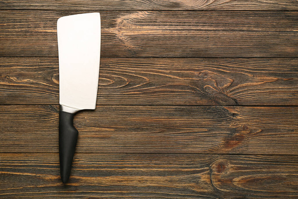 Meat cleaver on wooden background - Photo, Image