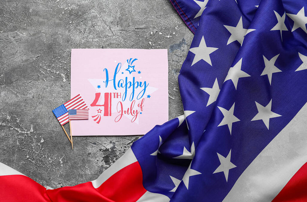 Greeting card with text HAPPY 4TH OF JULY and USA flags on grunge background - Photo, Image