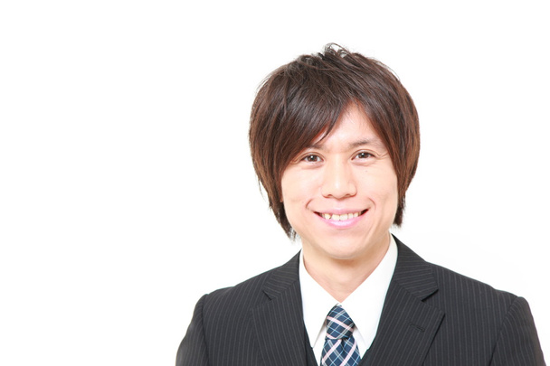 Japanese businessman smiles - Fotó, kép