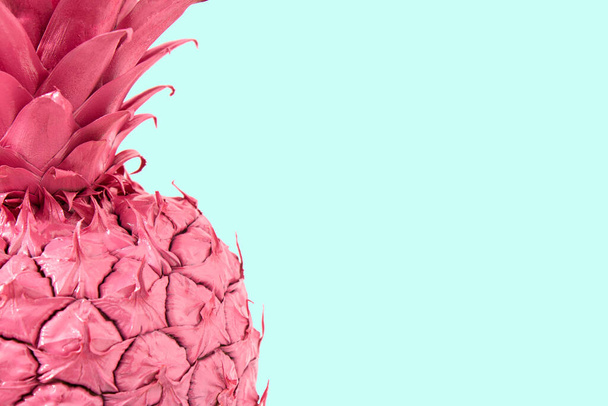 Creative Summer pastel pink pineapple card with copy space for message on blue background. - Foto, Imagen
