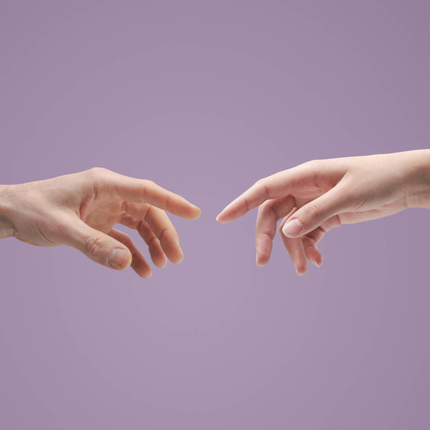 Male and female hands reaching for each other, togetherness and union concept, blank copy space - Foto, immagini