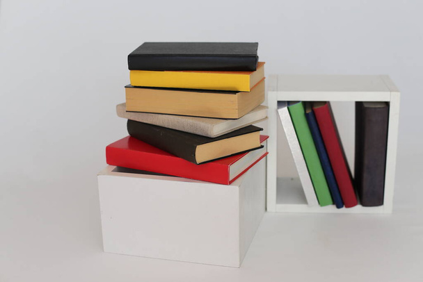 School books on white background - Foto, afbeelding