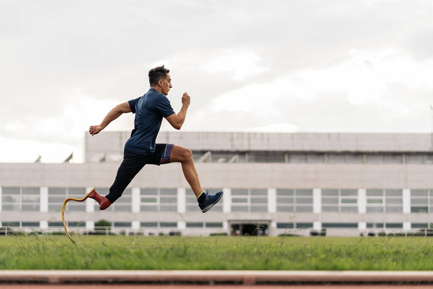 Disabled Young Man Athlete Running - 写真・画像