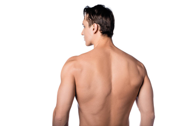 Rückseite des hemdslosen Mannes mit perfektem Körper isoliert auf weiß - Foto, Bild