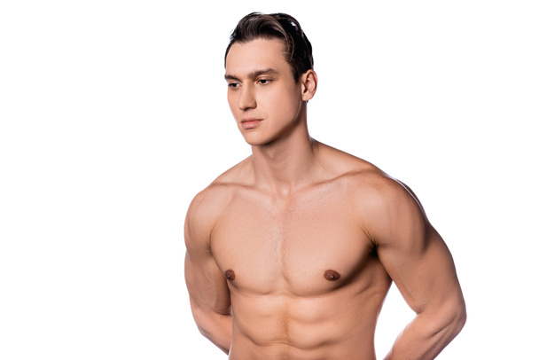shirtless man with muscular torso posing with hands behind back isolated on white - Foto, afbeelding