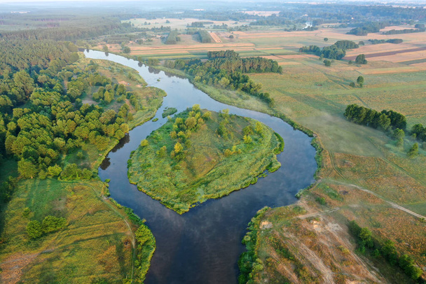 Aerial view of natural river during morning - Zdjęcie, obraz
