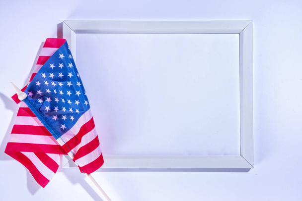 4 july independence day greeting card background with star confetti, American flags, festive decor, ribbon. USA Independence Day, American Labor day, Memorial Day, US election concept. - 写真・画像