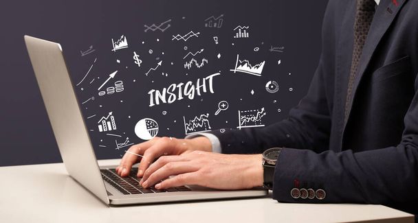 Businessman working on laptop with INSIGHT inscription, modern business concept - Фото, зображення