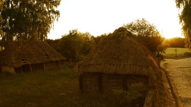 Two ancient huts on a sunny day. - Valokuva, kuva