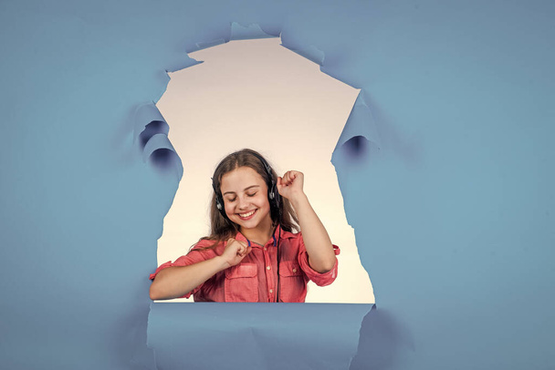 happy teen girl wear headphones and listen music, volume - Zdjęcie, obraz