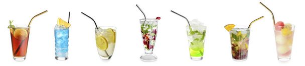 Set of refreshing cold cocktails in glasses on white background - Photo, Image