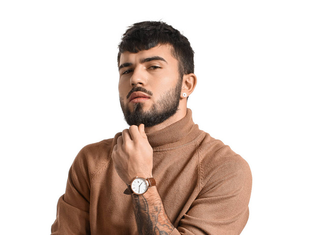 Thoughtful bearded man with stylish wristwatch on white background - Φωτογραφία, εικόνα