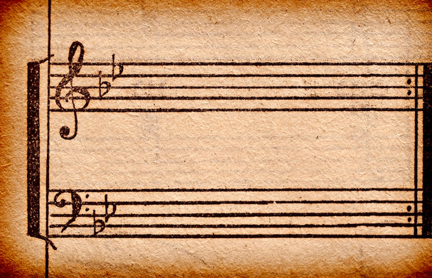 Music notes on old paper sheet, to use for the background - Photo, Image