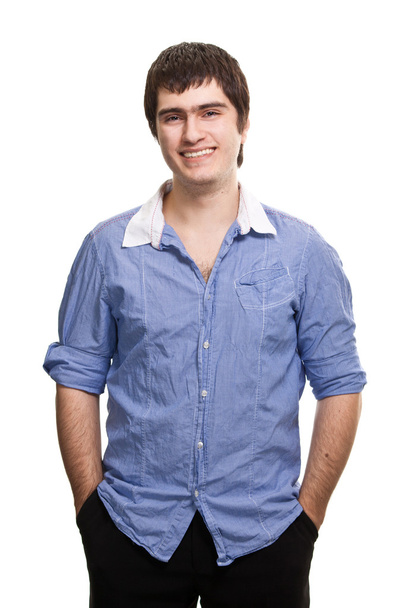 Nuori onnellinen mies hymyilee eristyksissä valkoisella taustalla
 - Valokuva, kuva