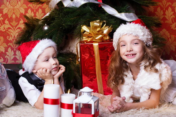 Happy children with christmas presents - Photo, Image