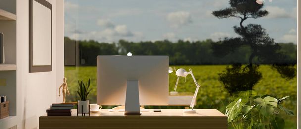 Moderner minimalistischer Homeoffice-Studio-Arbeitsplatz mit PC und Accessoires auf dem Tisch mit Blick durch das Glasfenster auf die Natur. Rückseite. 3D-Darstellung, 3D-Illustration - Foto, Bild