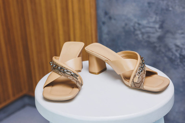 Beige slippers women's leather loafers. Casual women's style. Fashion footwear. - Fotó, kép