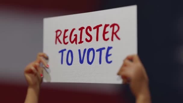 CGI hands showing placard, Register to vote  - Záběry, video