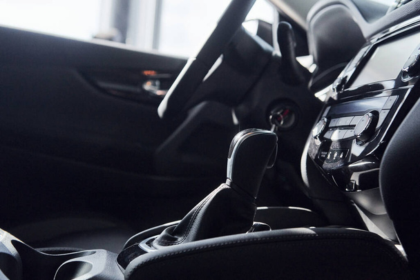 Steering wheel and front panel. Modern new luxury automobile interior. Design and technology. - 写真・画像