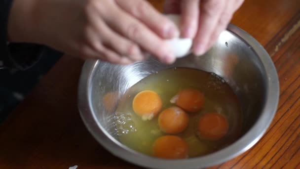Woman breaking an egg - Footage, Video