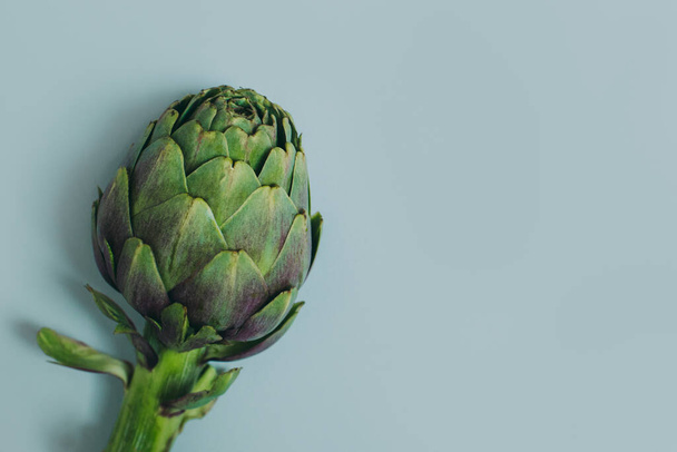 Fresh Artichoke on a grey background. Flat lay. Place for text. - Photo, Image
