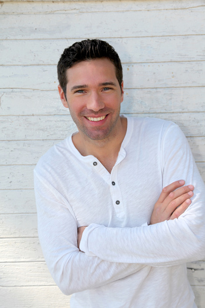 Smiling handsome man on white background - Foto, imagen