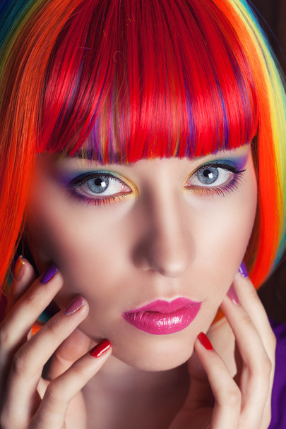 Woman wearing colorful wig - Foto, Imagen