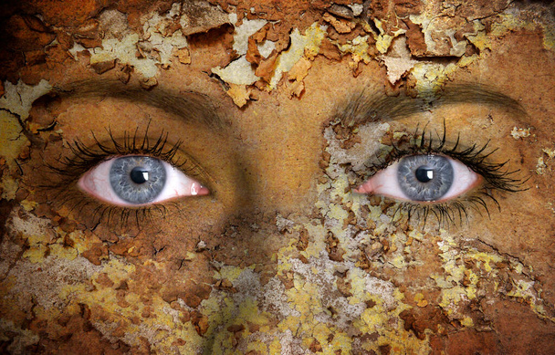 Cracked surface on woman face. Symbol of dry skin. - Photo, Image
