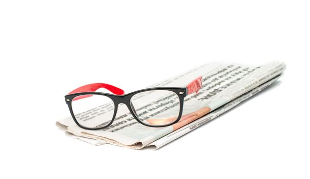 Newspaper with glasses - Foto, Imagen